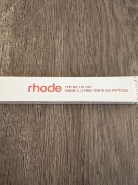 discontinued limited edition cinnamon roll rhode lipgloss